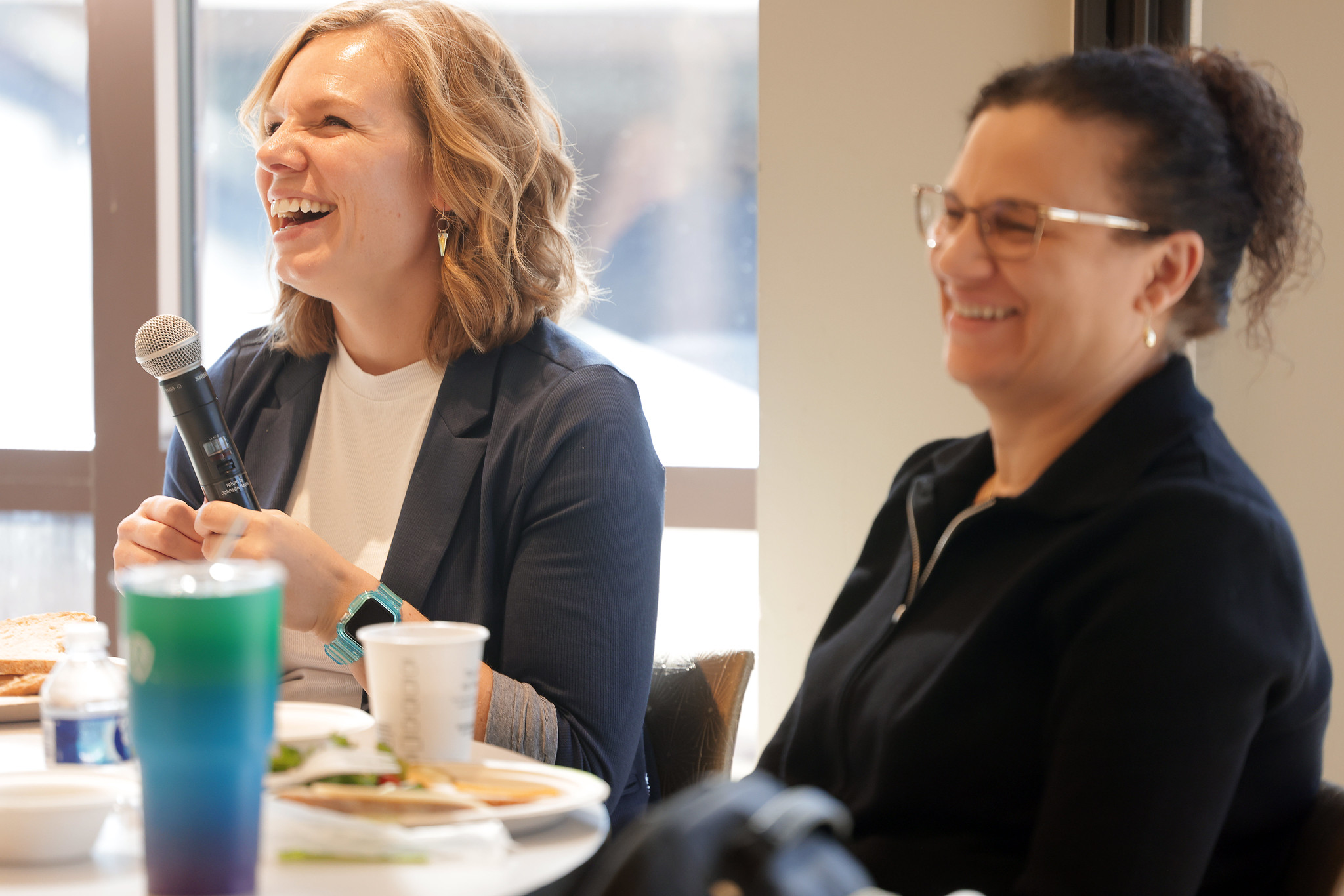 Michigan Engineering faculty member laughing during New Faculty Foundation luncheon