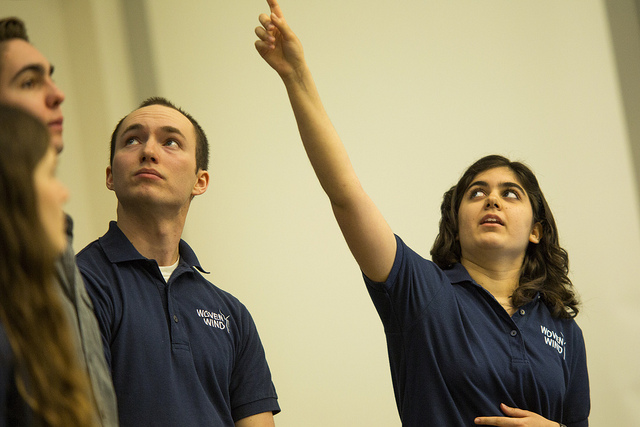 academic minor two speakers in uniform pointing